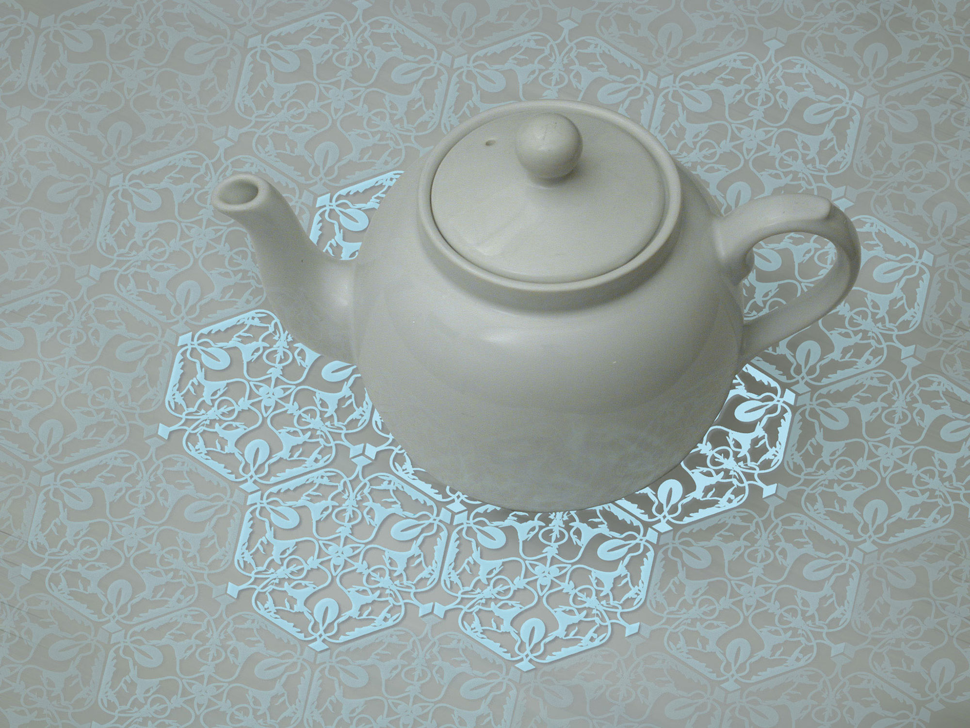 A photograph of a teapot on top of the History Tablecloth