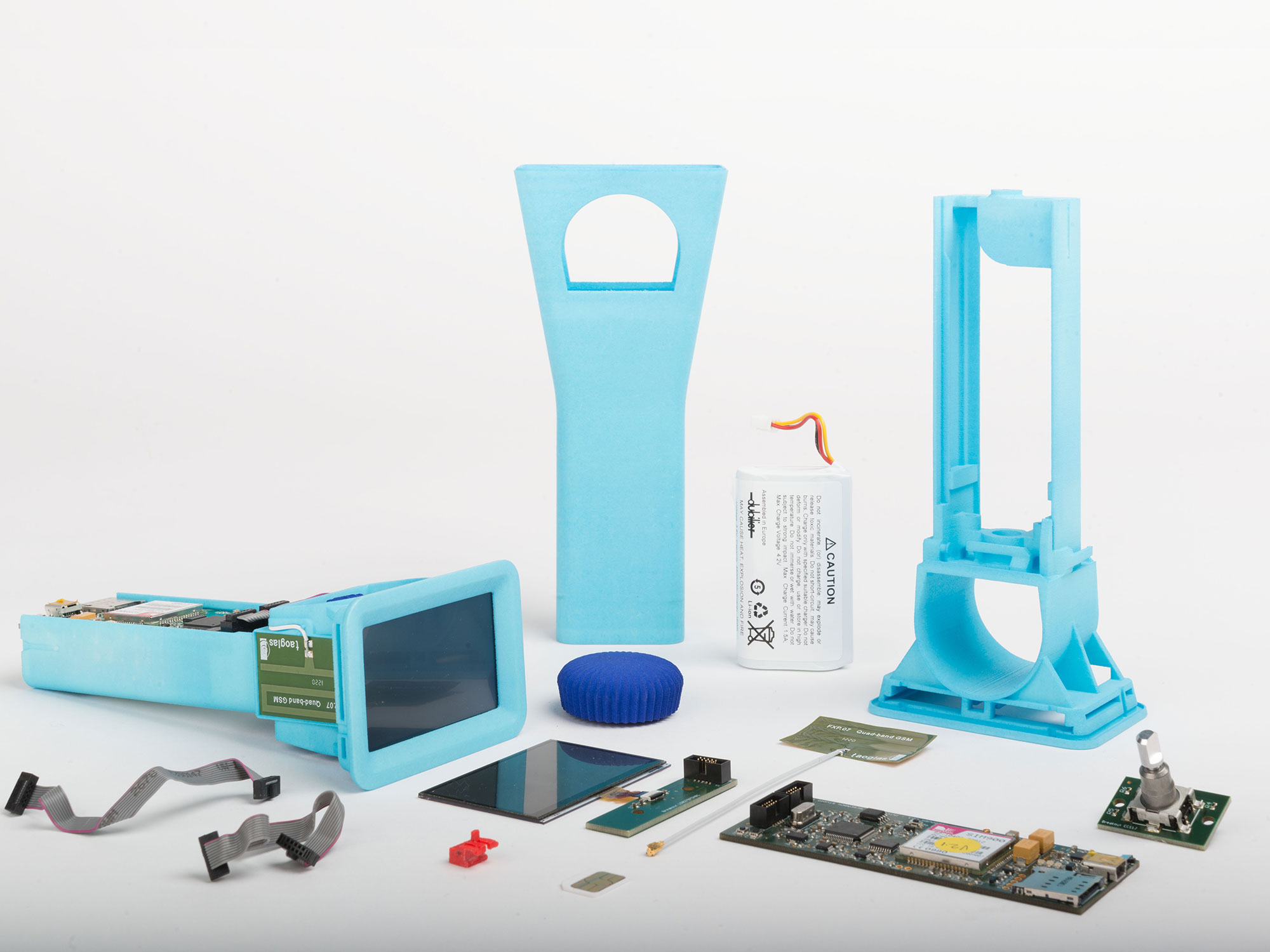 A photograph of an assembled and disassembled Datacatcher device